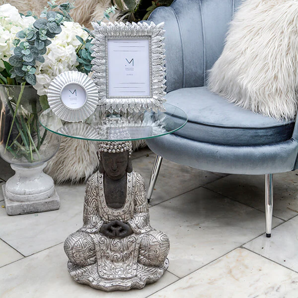 Silver Sitting Buddha Side Table with a Clear Glass Top